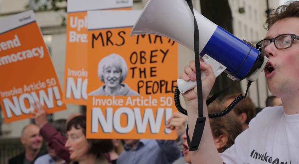 Tom Slater (right) leads a pro-Brexit demonstration in central London, 5 September 2016.