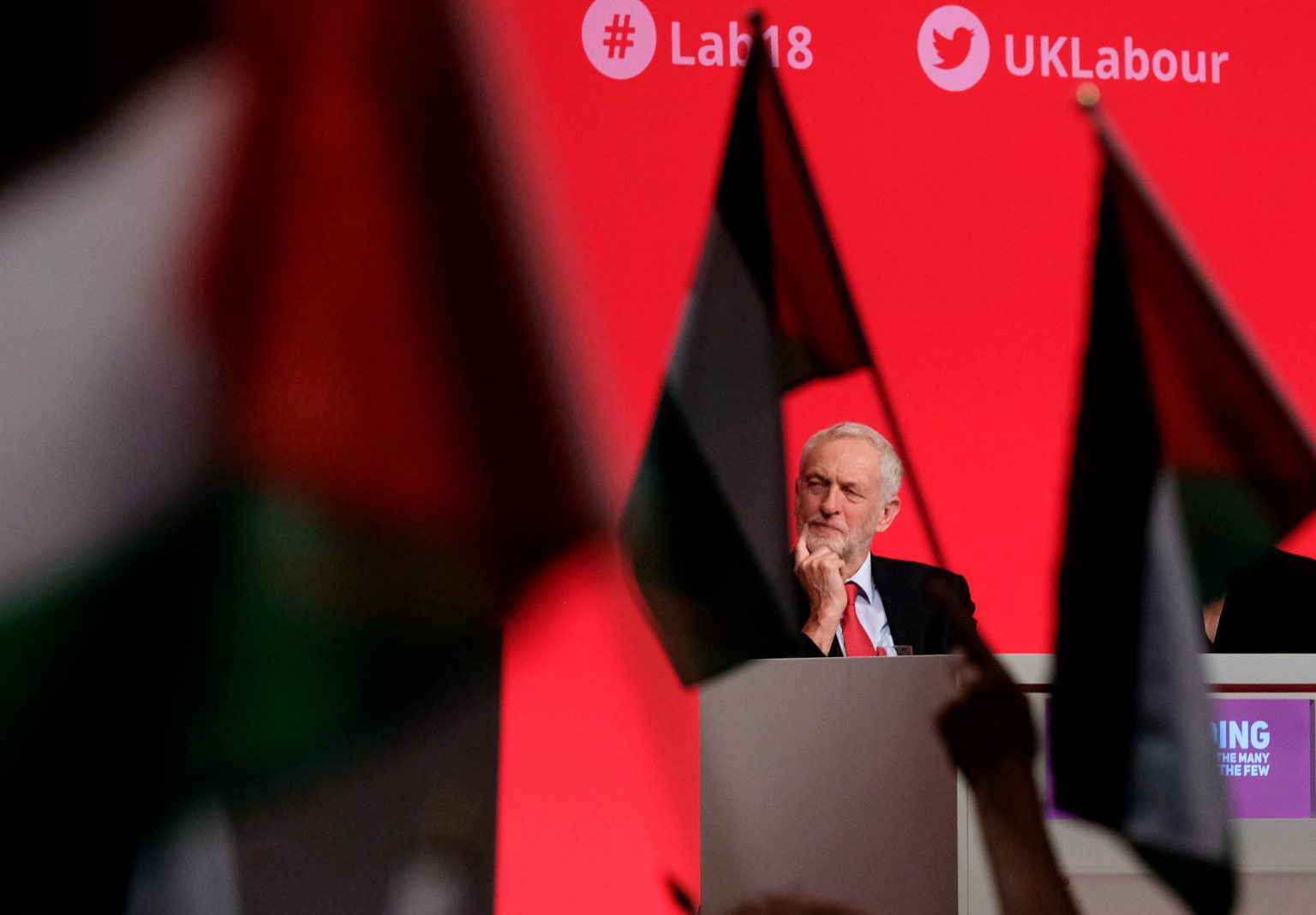 Delegates at the Labour Party conference wave Palestinian flags, 25 September 2018.