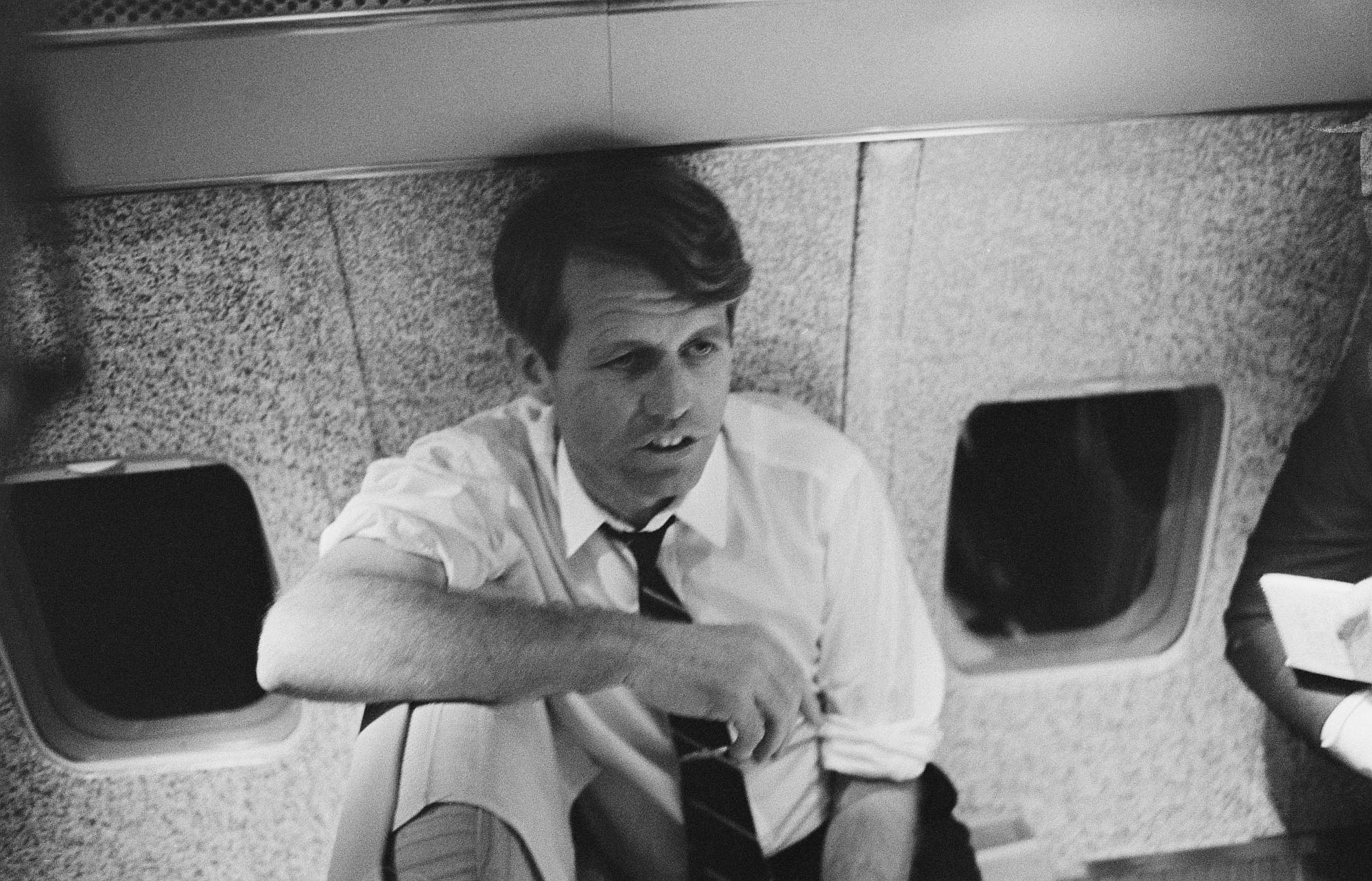 Bobby Kennedy on an airplane during his presidential election tour, 1968.