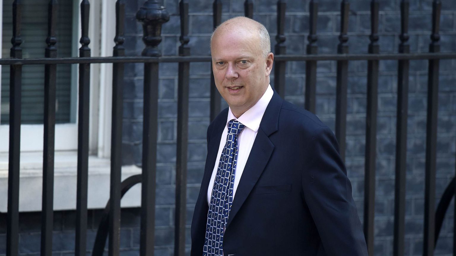 Does Chris Grayling have dirt on the PM?