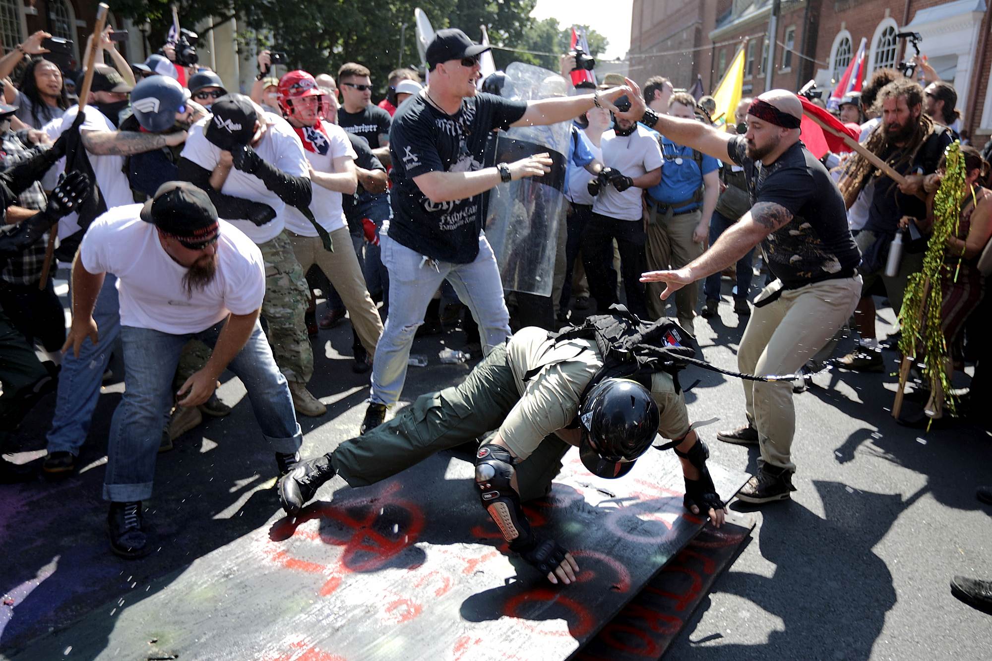 Members of the alt-right clash with counter-protesters during the 'Unite the Right' rally, 12 August 2017, in Charlottesville, Virginia.