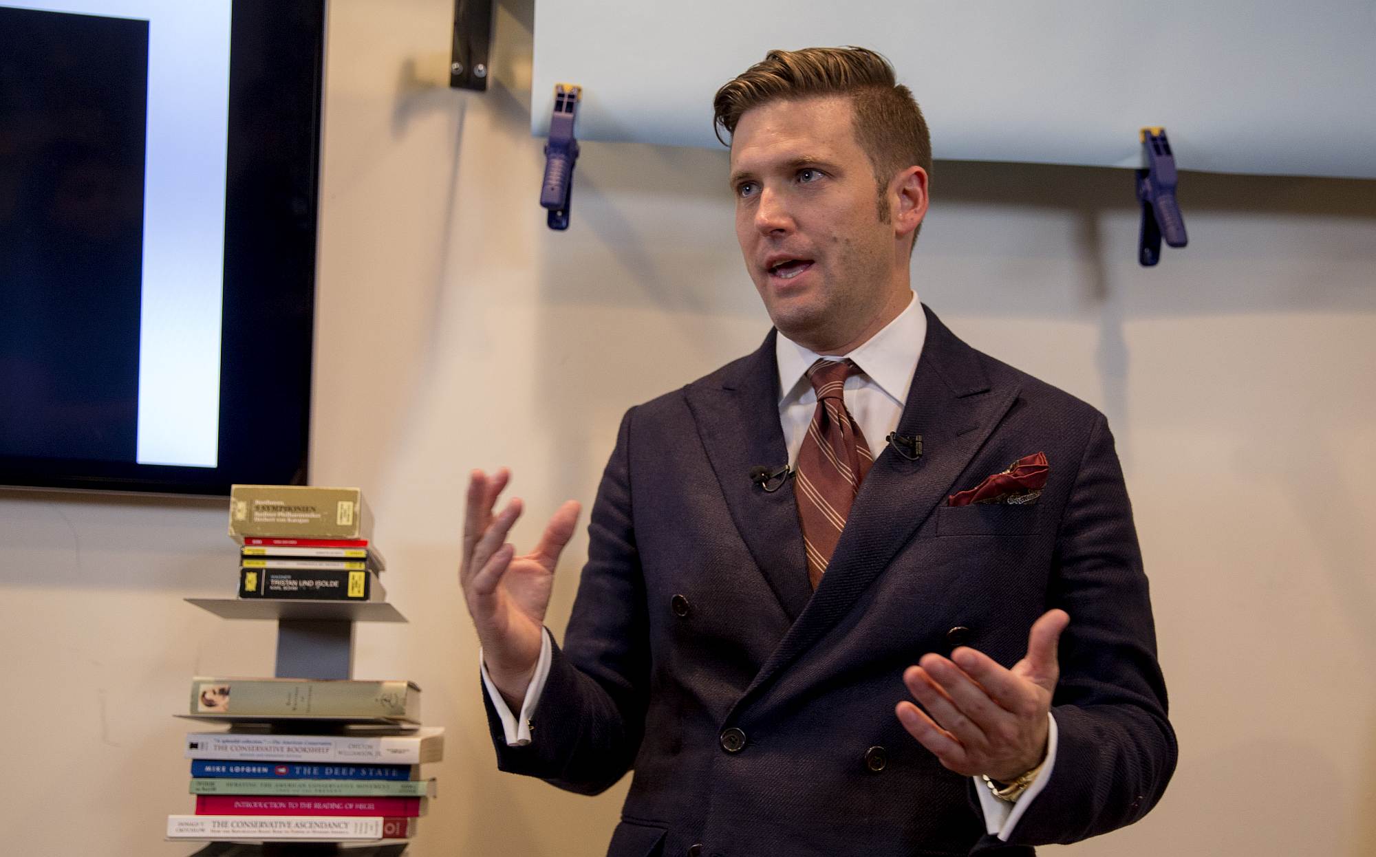 White nationalist Richard Spencer speaks to select media in his office space on 14 August 2017, in Alexandria, Virginia.