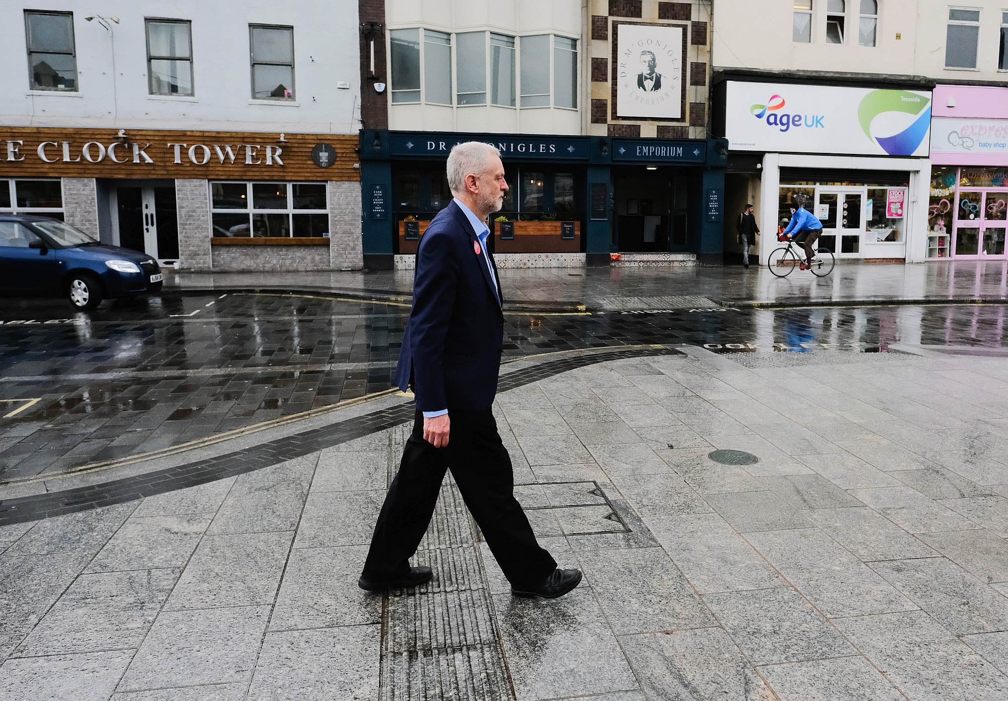 Then Labour leader Jeremy Corbyn walks through Stockton high street in Middlesbrough on 31 March 2017.