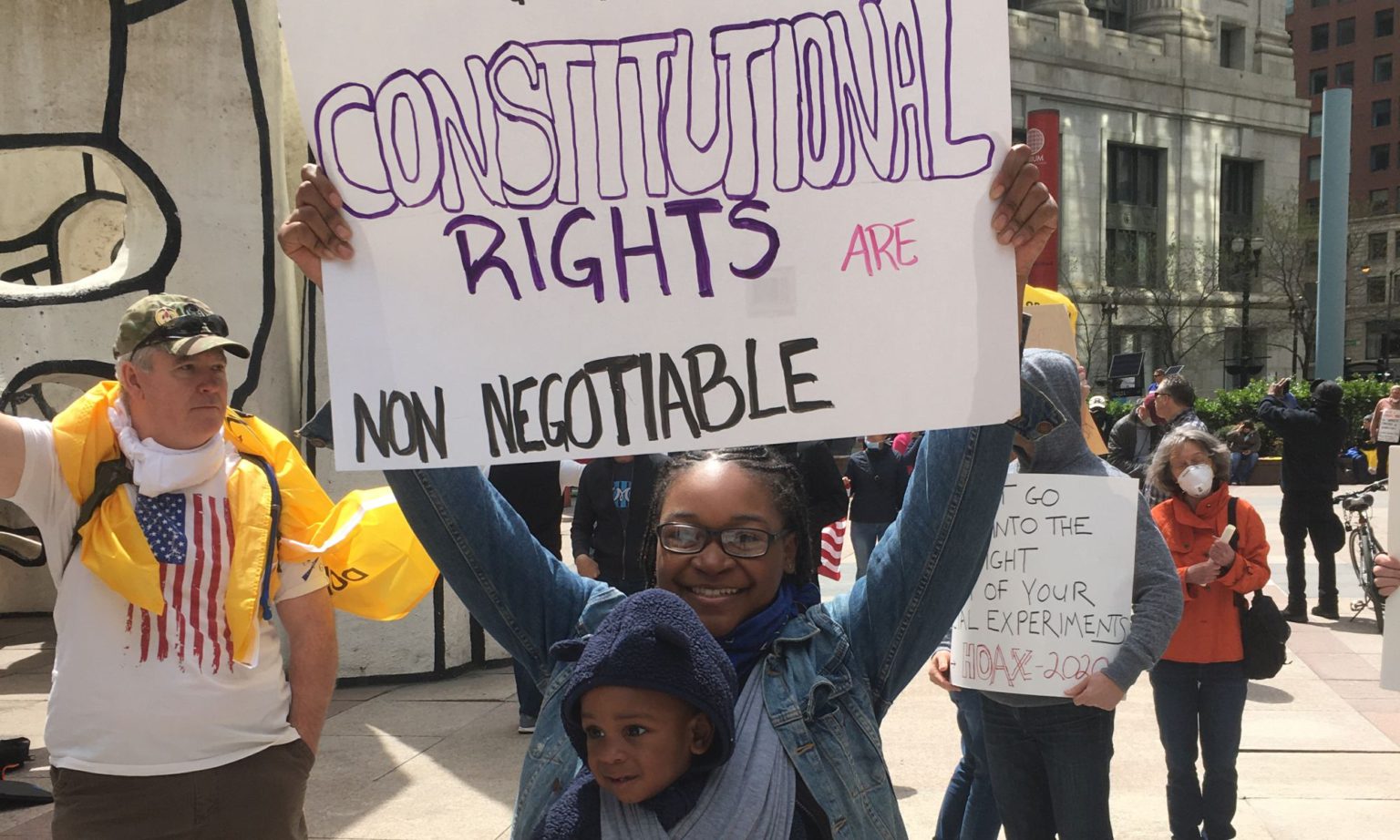 Lenise, a stay-at-home mom, at the ‘Re-Open Illinois’ protest in Chicago.