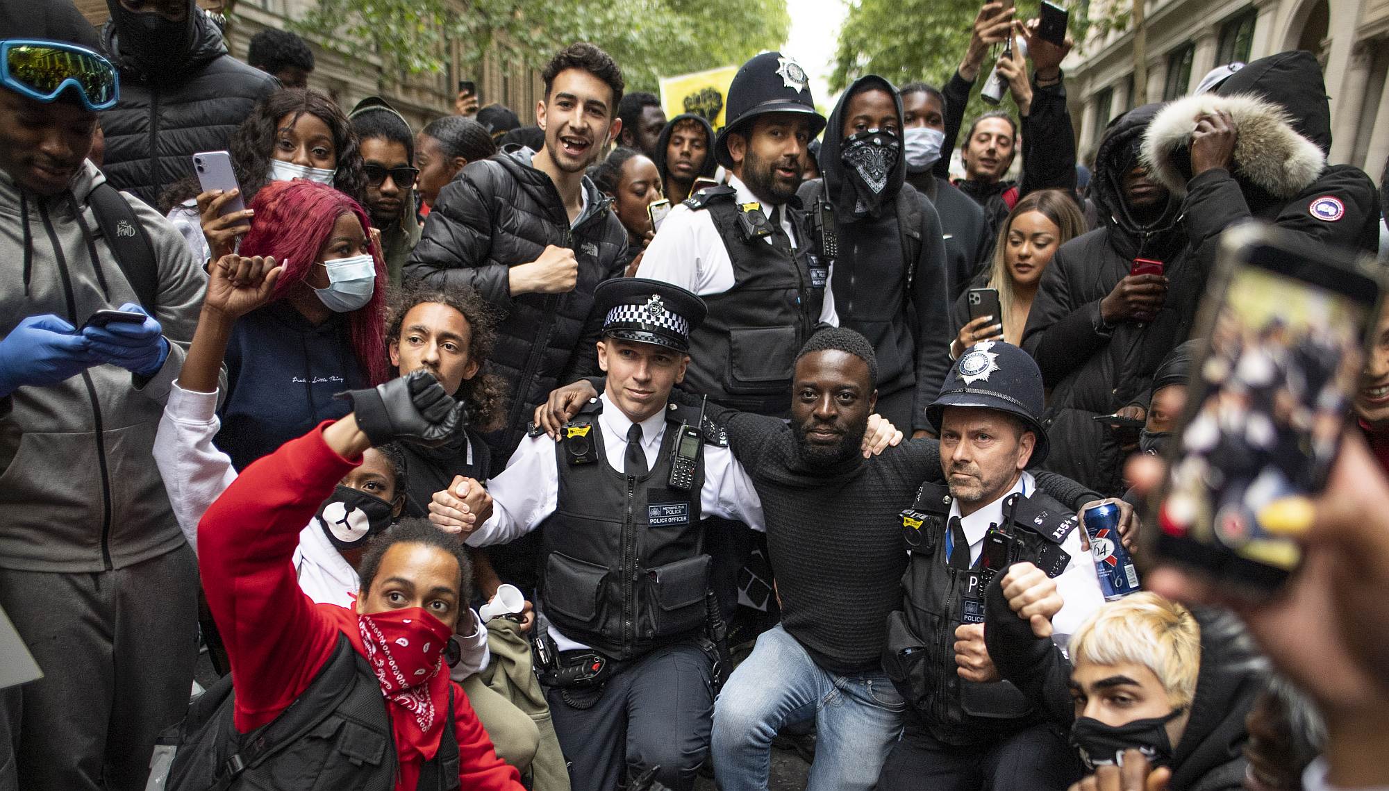 Protesters and police come together during a Black Lives Matter protest in London, 3 June 2020.