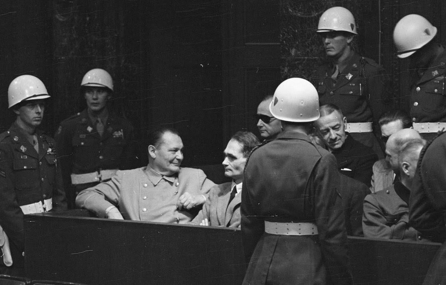 A break in the proceedings: defendants in a relaxed moment. Left to right: Goering, Hess, and, in the back row, Admirals Karl Doenitz (in the shades) and Erich Raeder. Photo: Lewis Woudhuysen