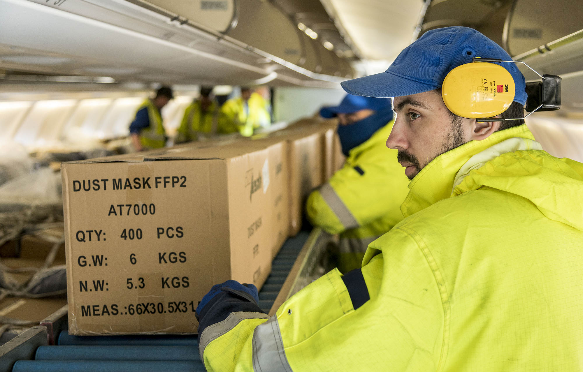 Boxes of protective masks delivered from Shanghai arrive at Frankfurt Airport, 25 March 2020.
