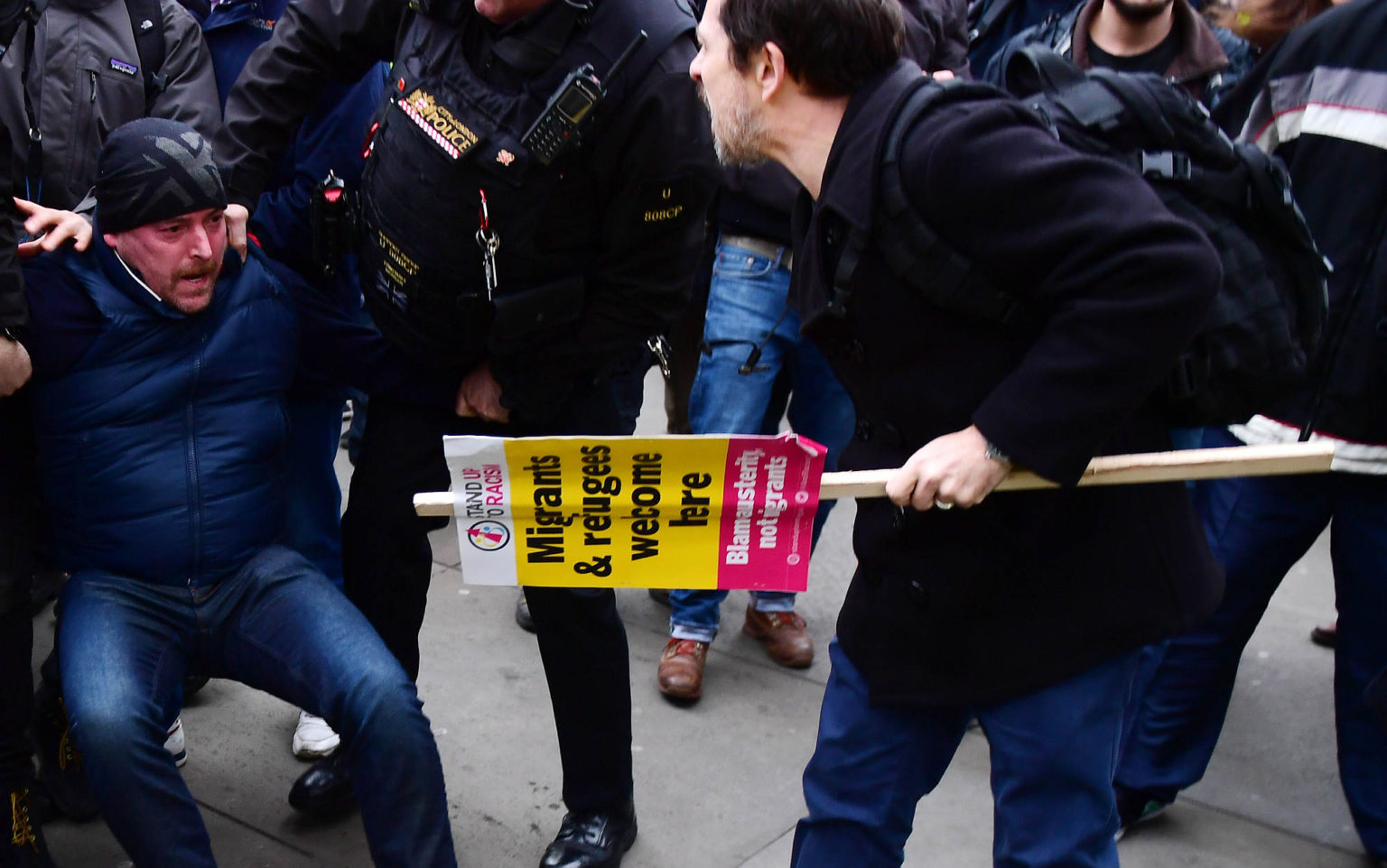 Demonstrators clash over Brexit during a protest in Trafalgar Square, 12 January 2019.