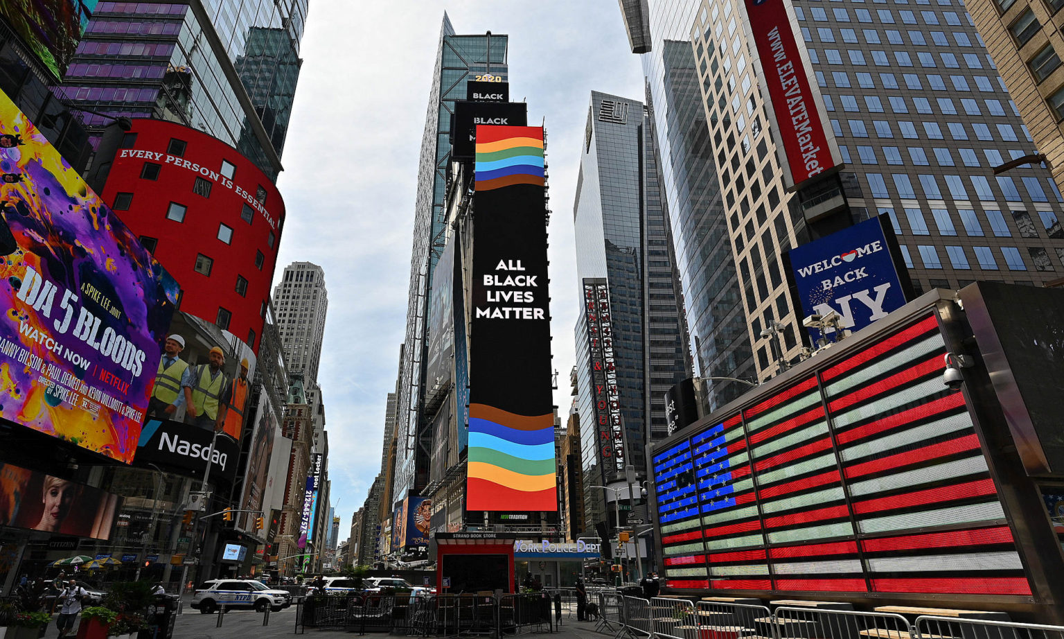 Billboards light up with 'All Black Lives Matter' message and Pride flag in Times Square, 24 June 2020.