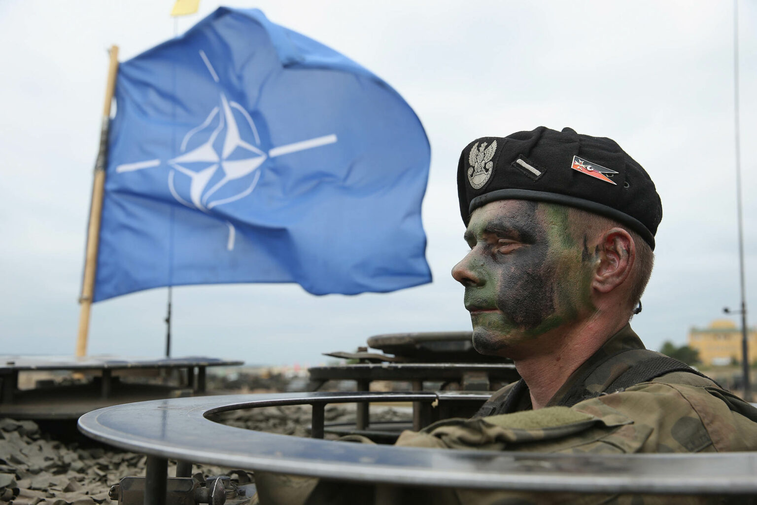 A soldier of the Polish Army mans a tank during the NATO Noble Jump military exercises in Zagan, Poland, 18 June 2015.