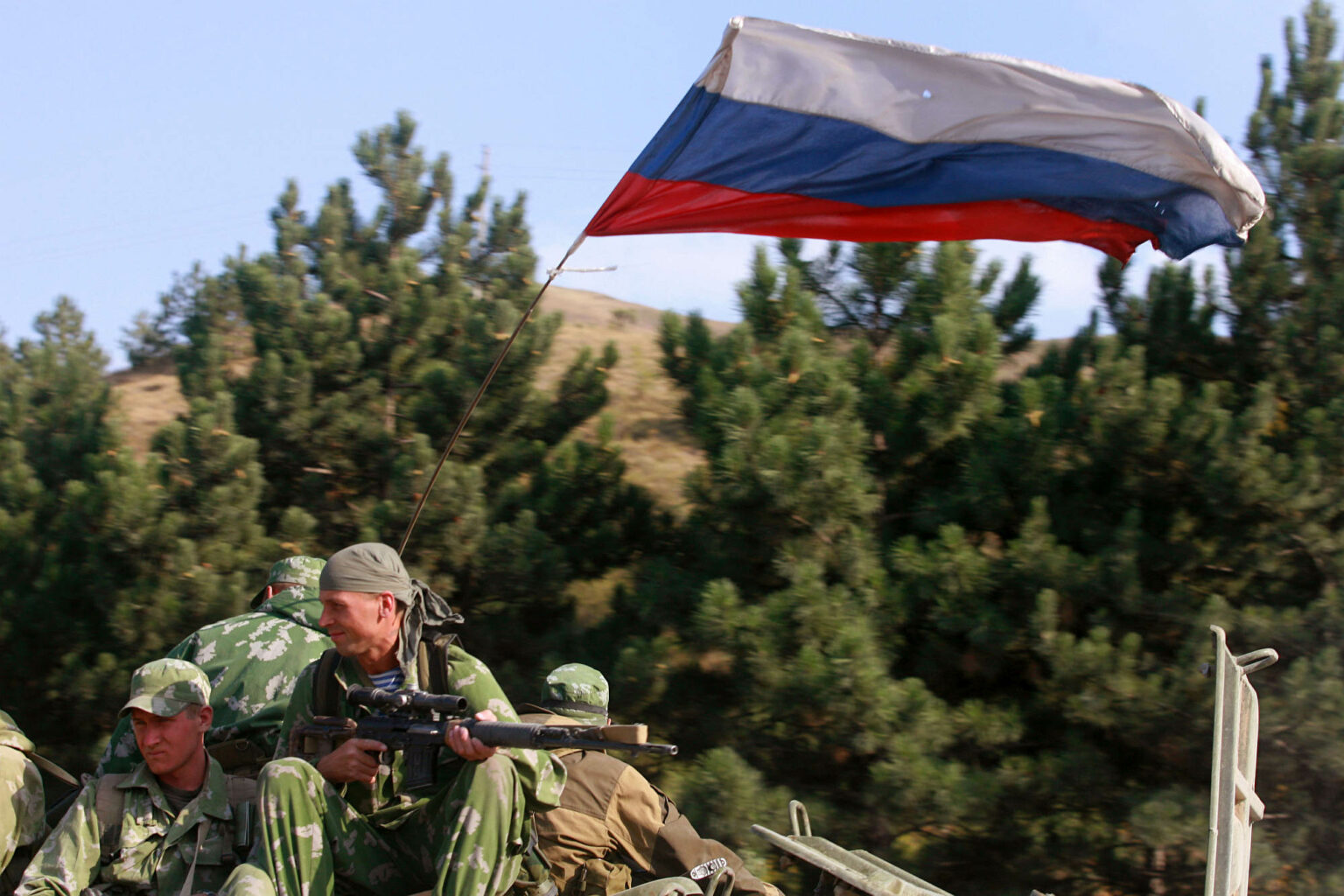 Russian soldiers fly their flag at a Russian army position just outside the town of Gori, Georgia, on 18 August 2008. (Credit: Getty.)