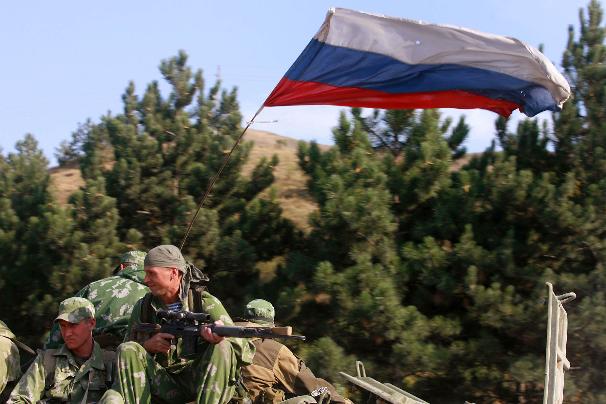 Russian soldiers fly their flag at a Russian army position just outside the town of Gori, Georgia, on 18 August 2008. (Credit: Getty.)
