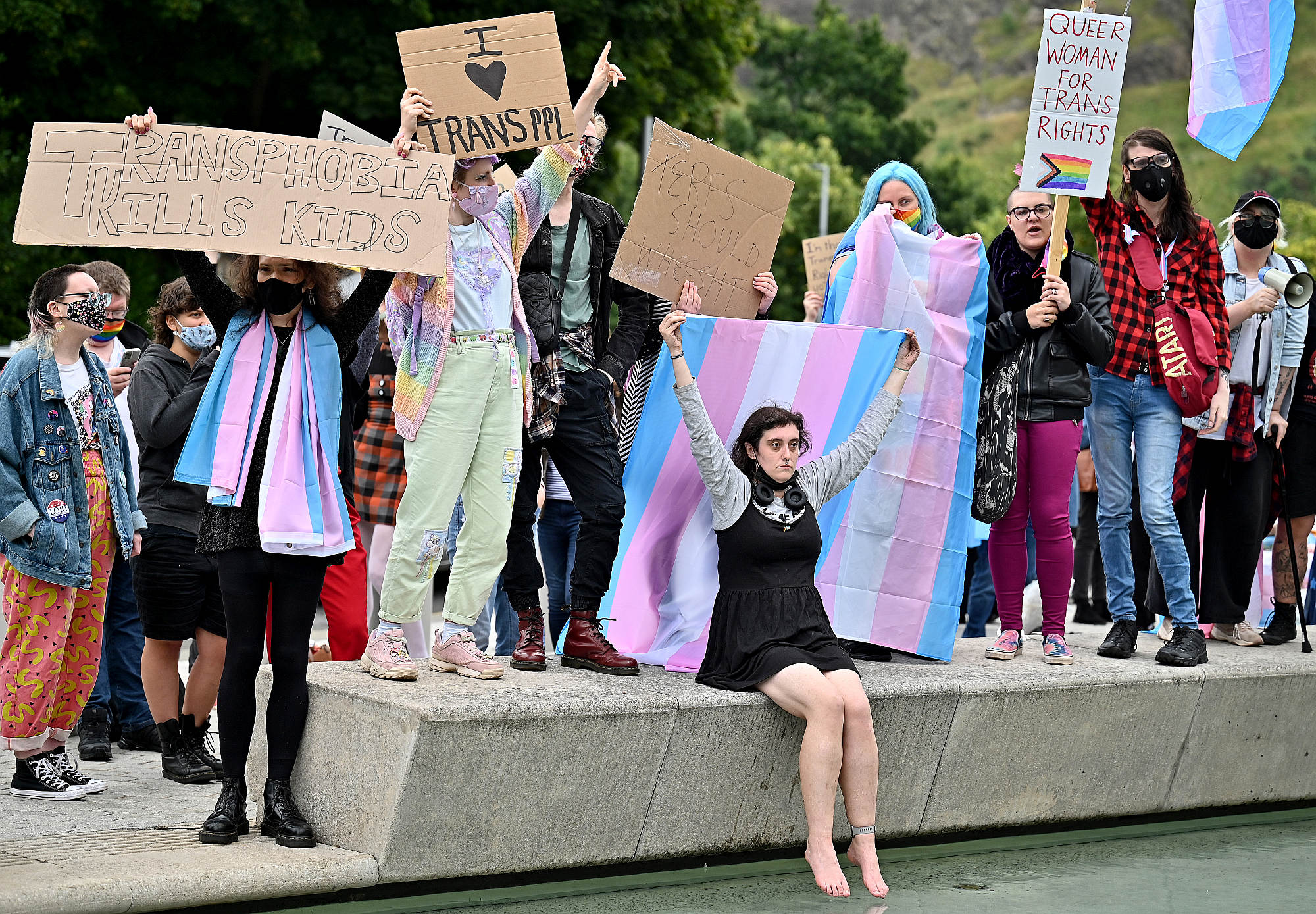 Trans-rights activists hold a demonstration in Edinburgh, 2 September 2021 .