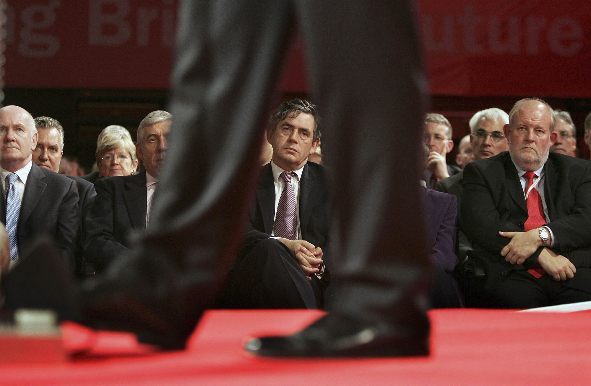 Cabinet members, including Gordon Brown, watch as Blair makes his keynote speech at the Labour Party conference, 27 September 2005.
