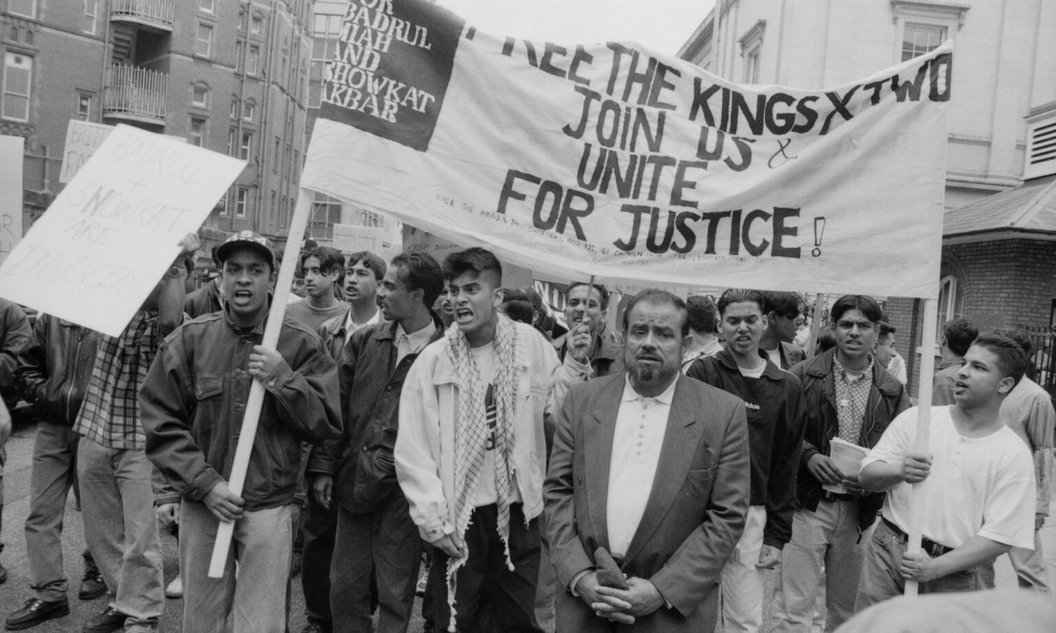 Demonstrators protest the convictions of Badrul Miah and Showkat Akbar for the killing of schoolboy Richard Everitt, on 31 August 1996.