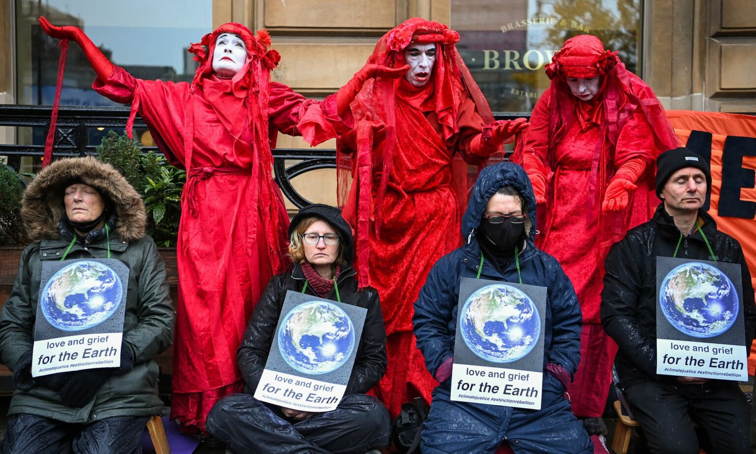 Extinction Rebellion protests hold a 'die in' outside the Glasgow offices of asset-management firm Mercer in 2021.