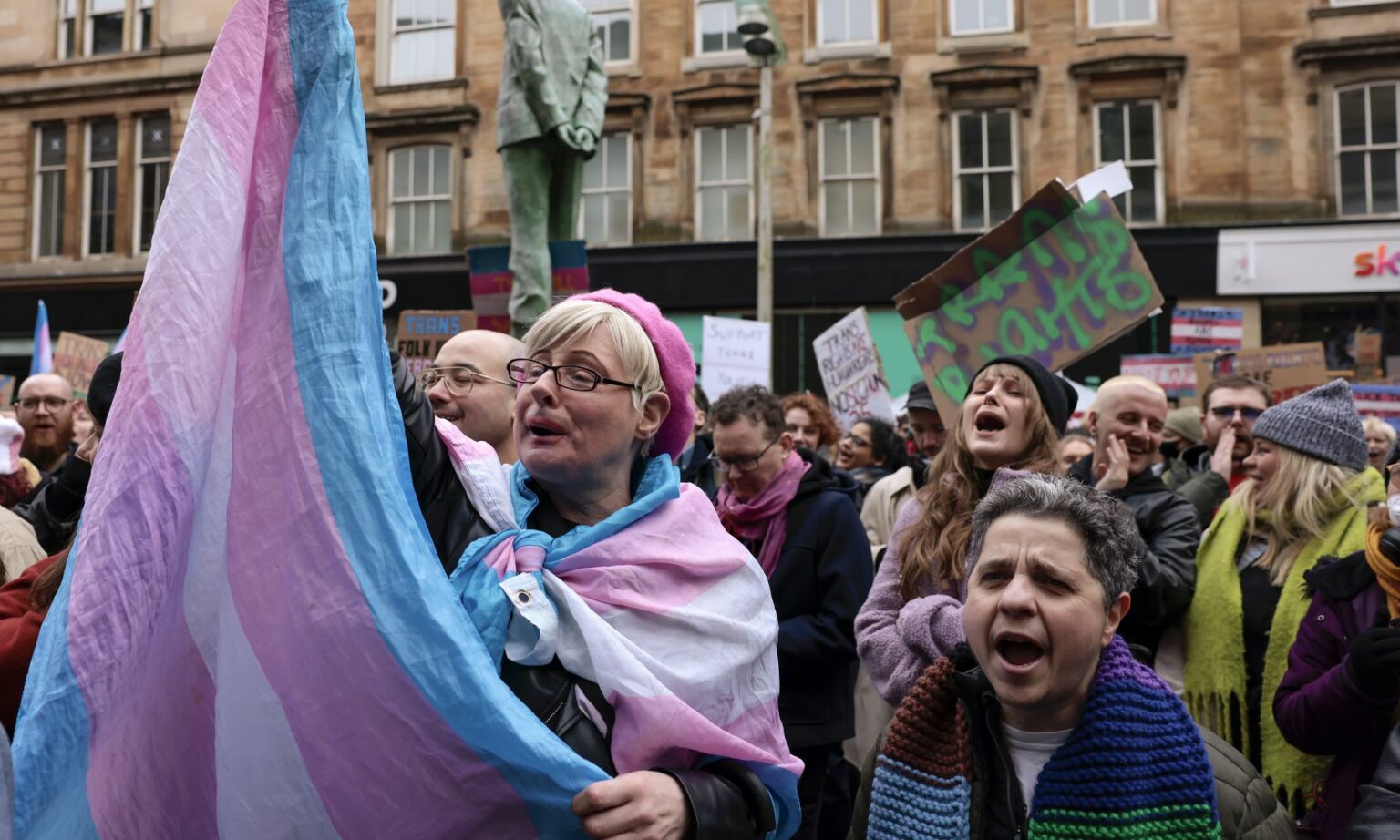 Trans rights demonstrators attend a rally on Buchanan Street on January 21, 2023 in Glasgow, Scotland.