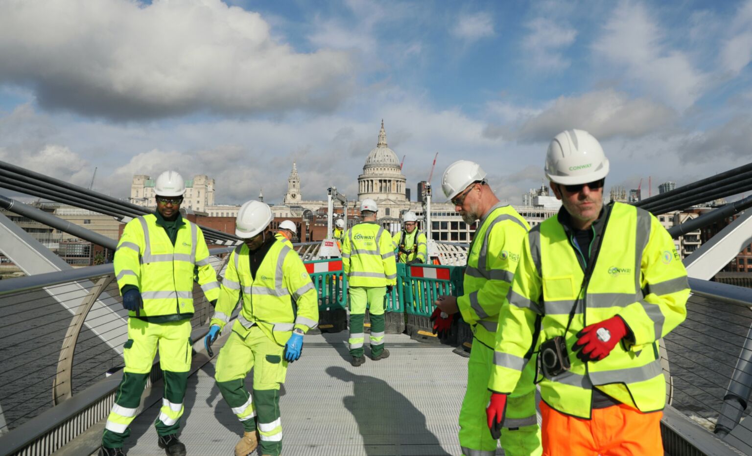 Construction workers on London's Millennium Bridge on 24 October 2023.