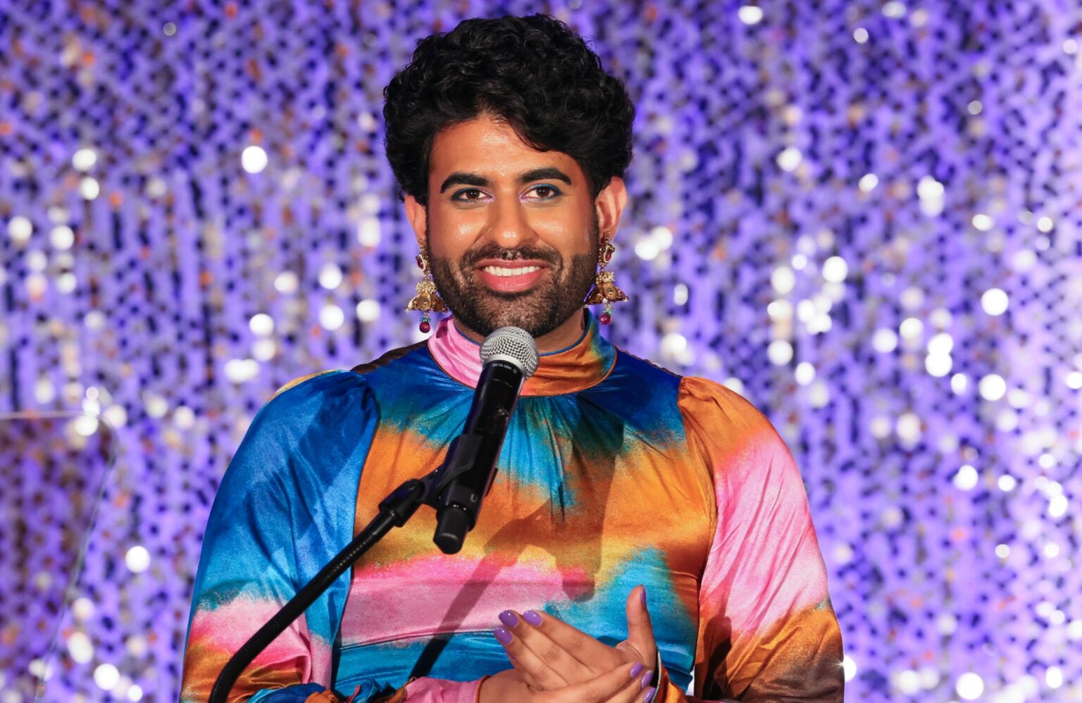 Alok Vaid-Menon accepts the 'trailblazer award' at CAPE's Radiance Gala at Wilshire Ebell Theatre in Los Angeles, 11 March 2024. 