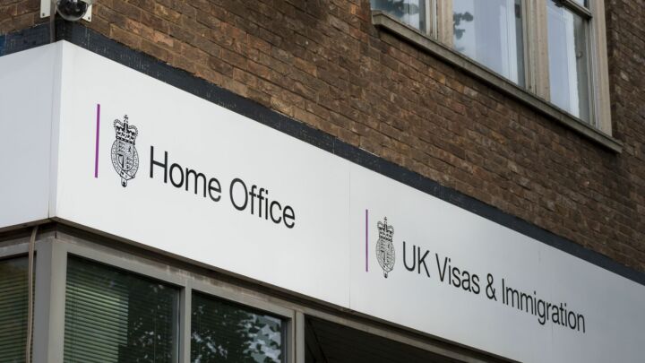 Why was an Afghan flasher granted asylum?