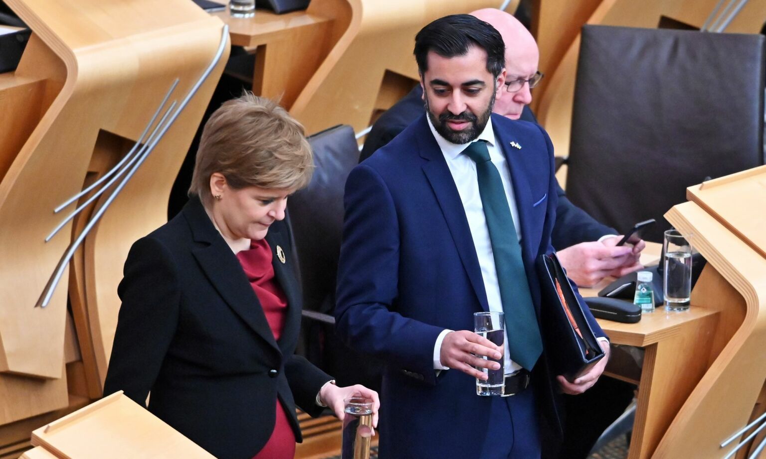 Humza Yousaf accompanies Nicola Sturgeon in the Scottish Parliament, on 16 March 2023 in Edinburgh, Scotland.