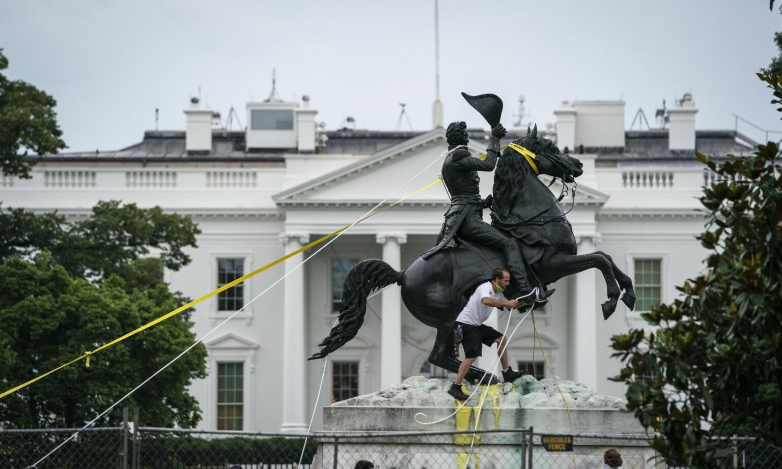 Protesters attempt to pull down the statue of Andrew Jackson in Lafayette Square near the White House on 22 June 2020 in Washington, DC.