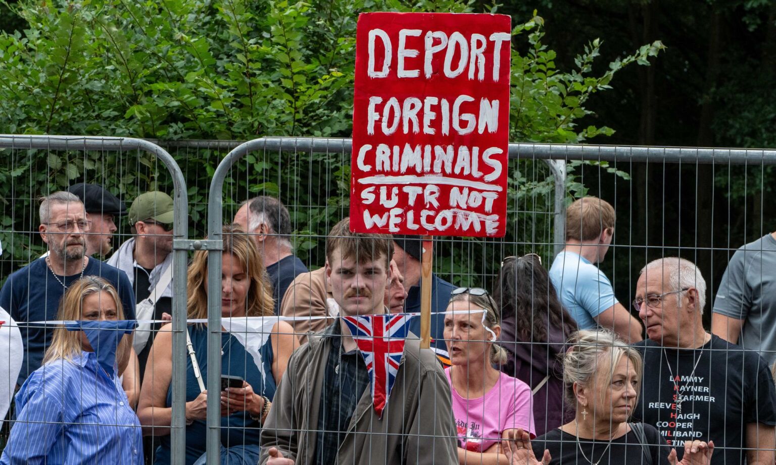 Protesters outside the Bell Hotel in Epping, Essex. 