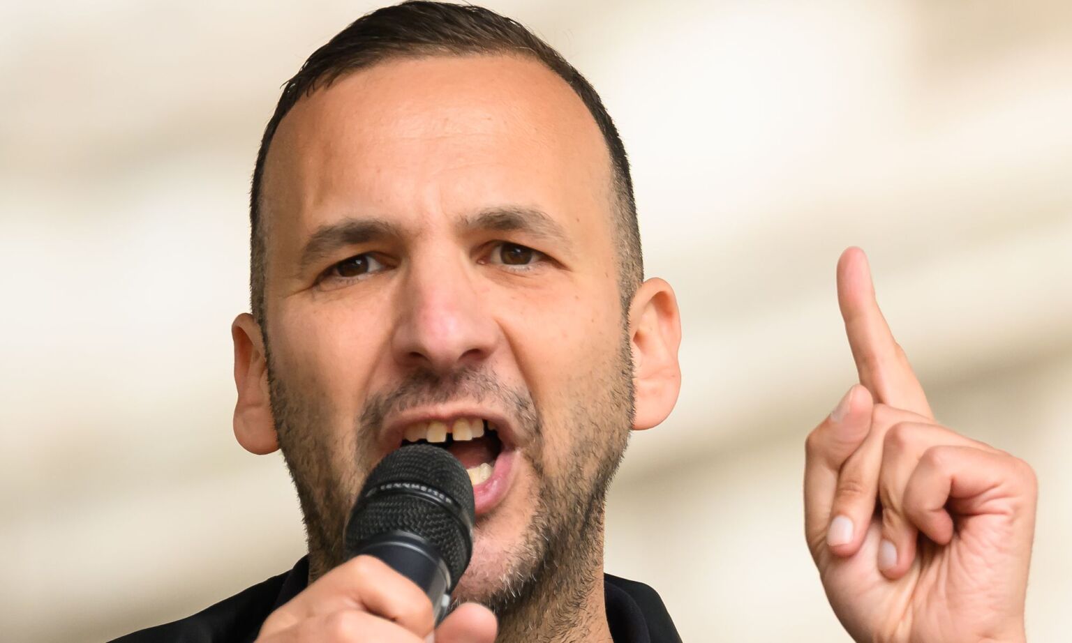 The Green Party's Zack Polanski speaks during a protest over benefits cuts organised by People's Assembly, 7 June 2025.