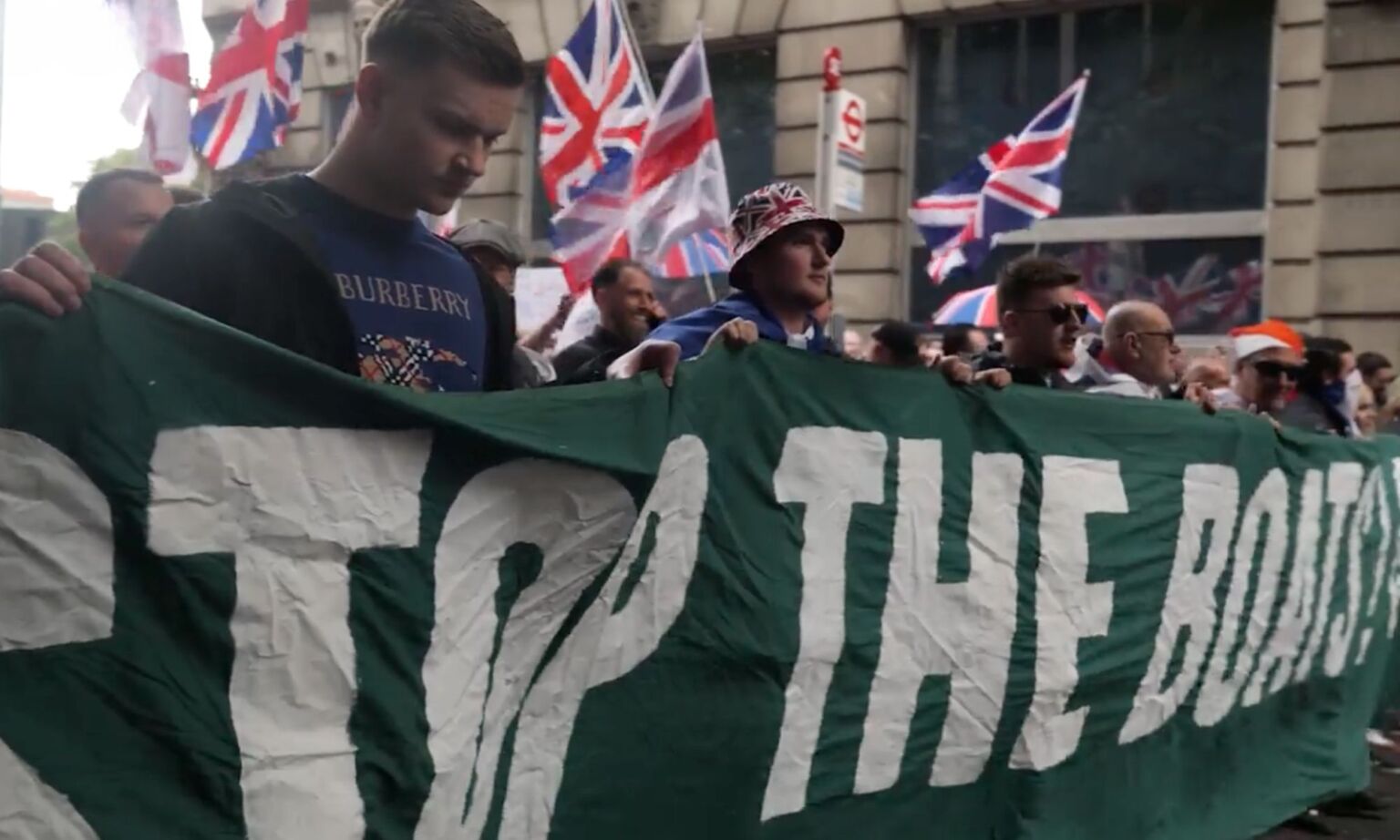Unite the Kingdom protesters march against illegal migration.