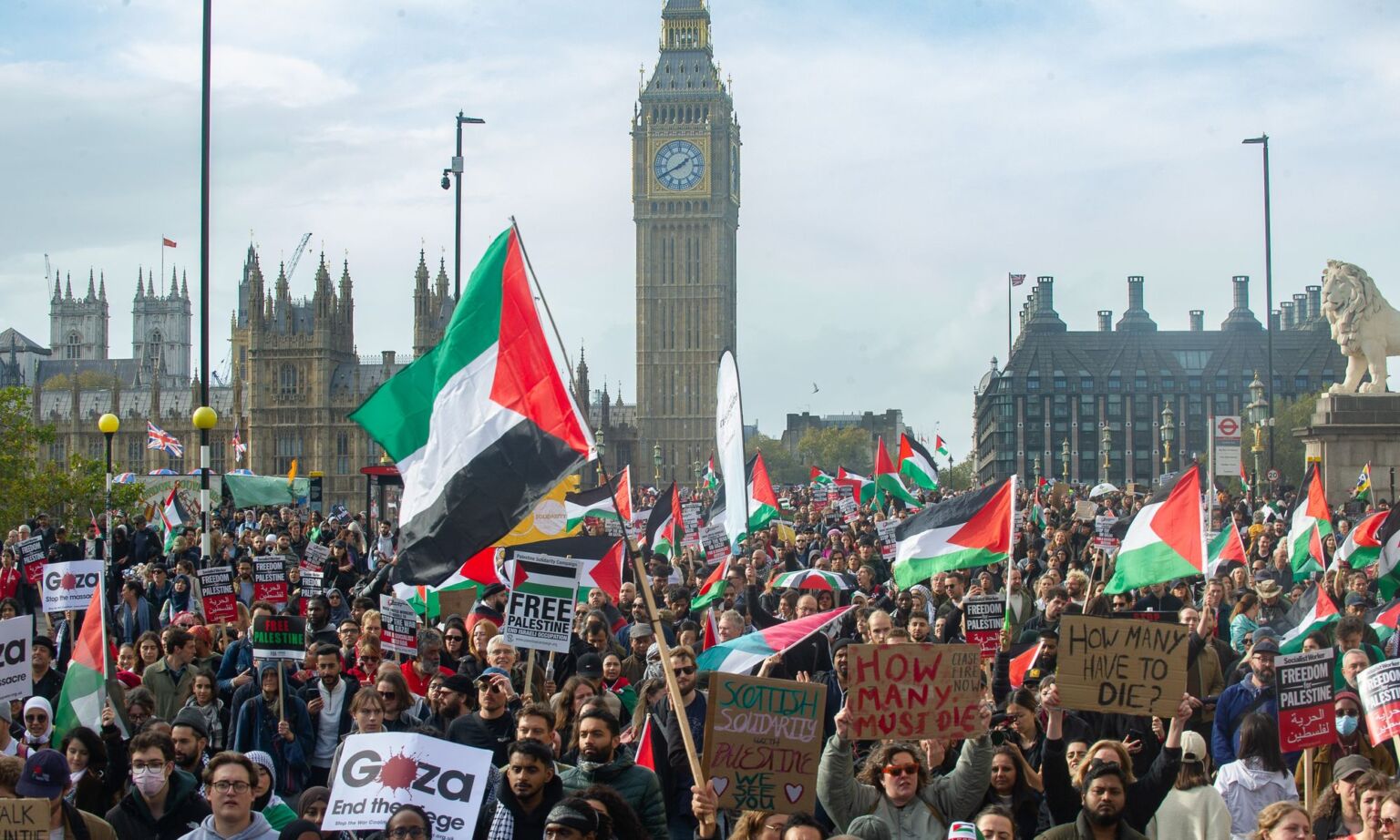 An anti-Israel march passes over Waterloo bridge on 28 October 2023 in London, England.