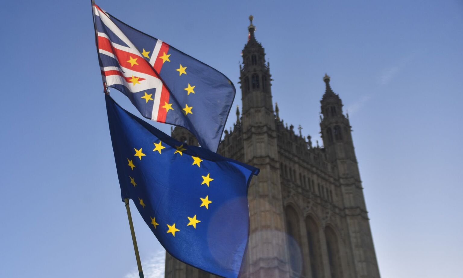 An EU and a Union flag wave outside parliament, London, 8 January 2019.
