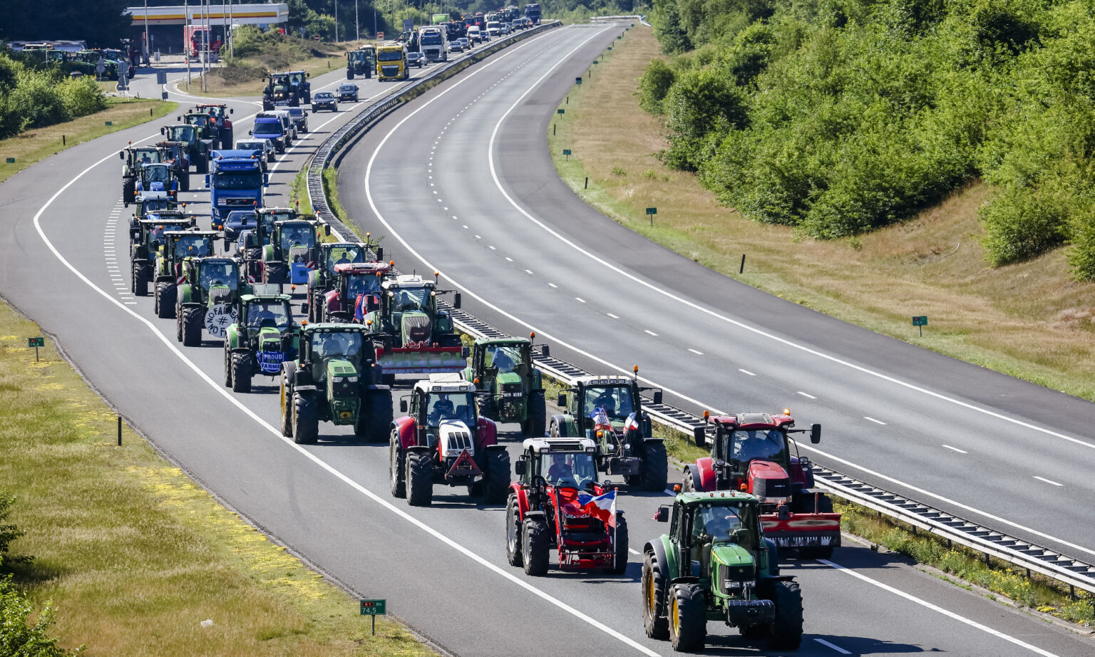 Tractors return from a farmers’ protest against the Dutch government’s nitrogen rules, 22 June 2022.