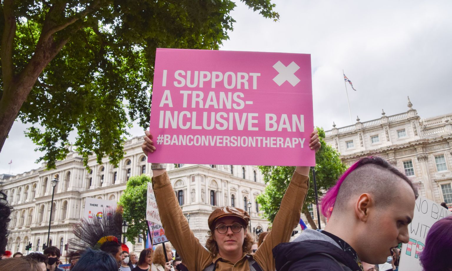 A protester supporting a trans-inclusive conversion therapy ban outside Downing Street, 6 June 2022.