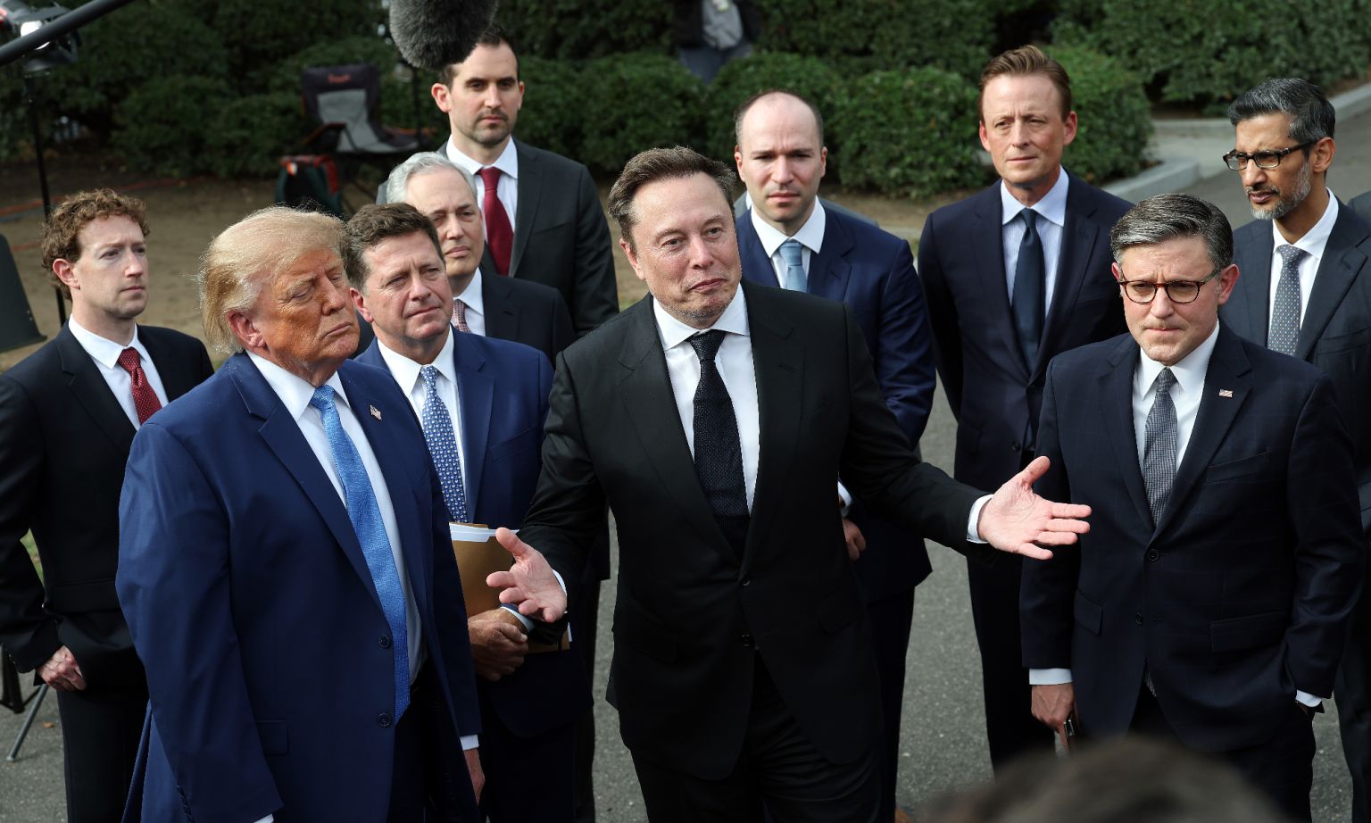 Elon Musk, CEO of Tesla and SpaceX, stands with President Donald Trump, Mark Zuckerberg, CEO of Meta Platforms, and others following a meeting on artificial intelligence outside the White House on 29 September 2026. 