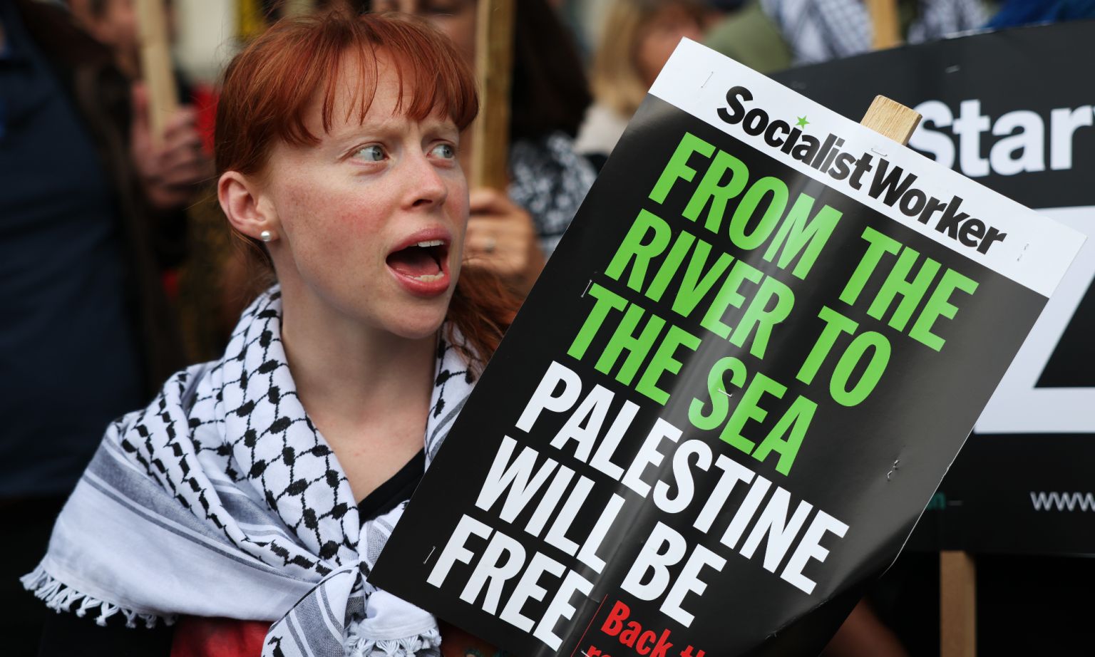 Pro-Palestine supporters demonstrate near Downing Street on 9 September 2025.